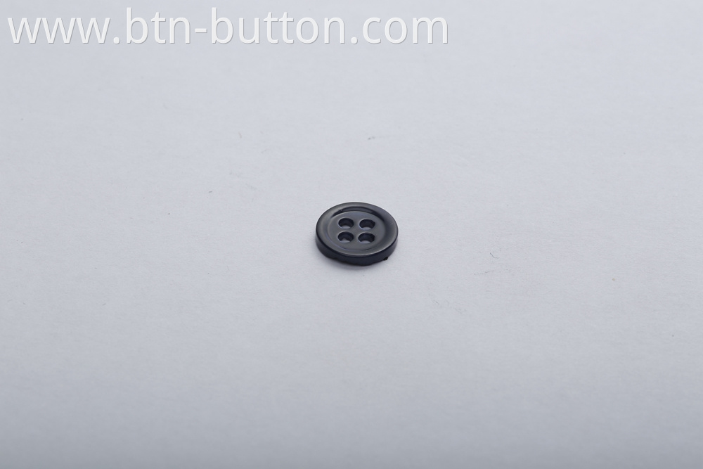 Shell buttons are used in knitted sweaters